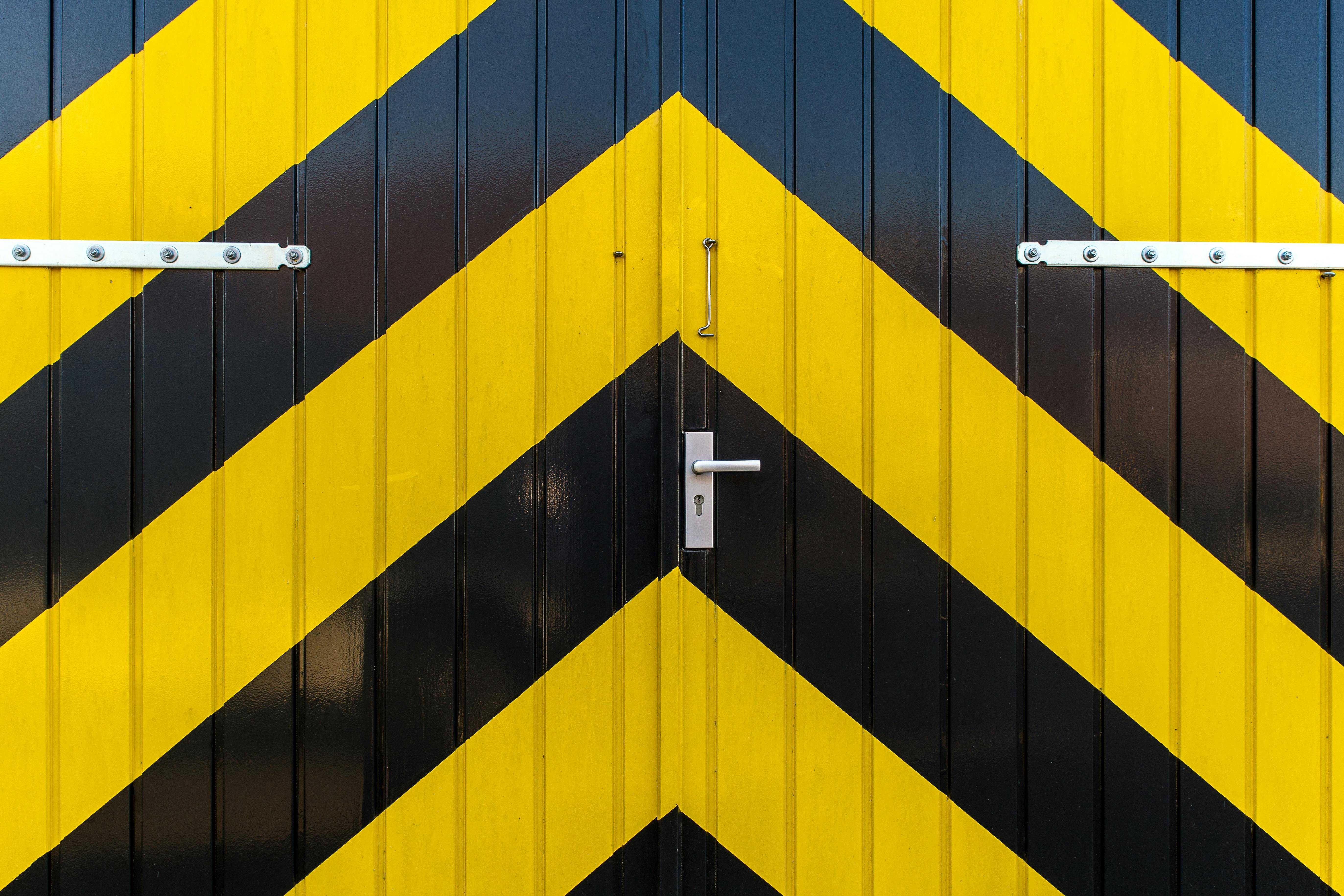Custom garage door installation with geometric design